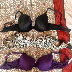 Victoria's Secret Black, Leopard, and Purple Bra Set